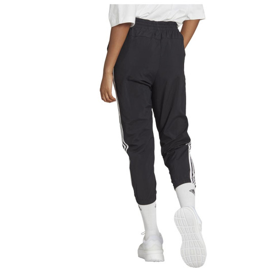 Adidas Γυναικείο παντελόνι φόρμας Essentials W 3-Stripes Woven 7/8 Pants Adidas Γυναικείο παντελόνι φόρμας Essentials W 3-Stripes Woven 7/8 Pants